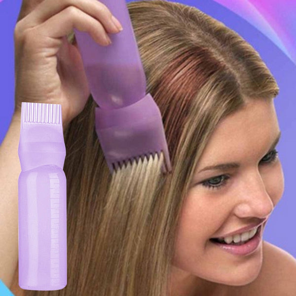 Garrafa de cabelo vazio com pincel aplicador.